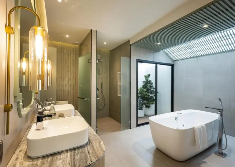 Luxurious bathroom with bathtub at La Solaya Khao Lak