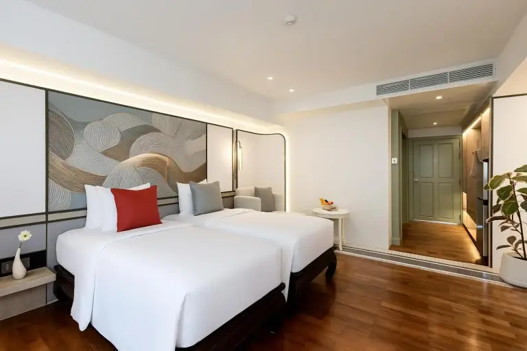 Twin bed room at La Solaya Khao Lak with elegant style